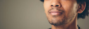 man with eyes closed