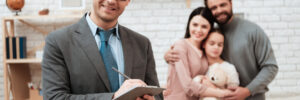 therapist in front of blurry family