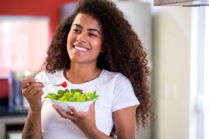 young woman eating a healthy meal