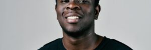 young man smiling into the camera