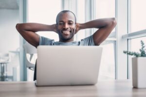 middle aged man talking to therapist online