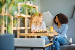 two friends catching up over coffee