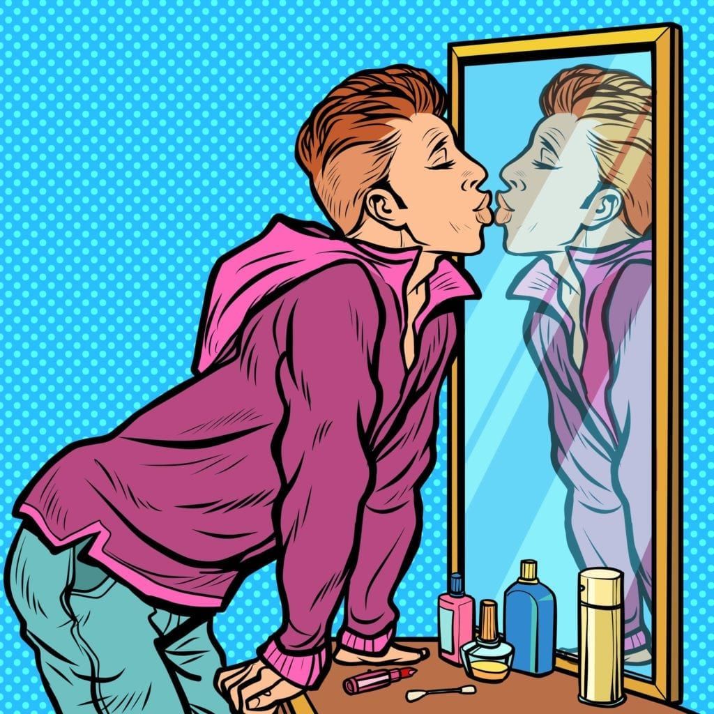 Man kissing mirror to illustrate narcissism