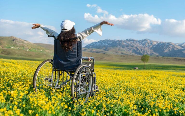 Woman in Wheelchair in a Field Overcoming Challenges